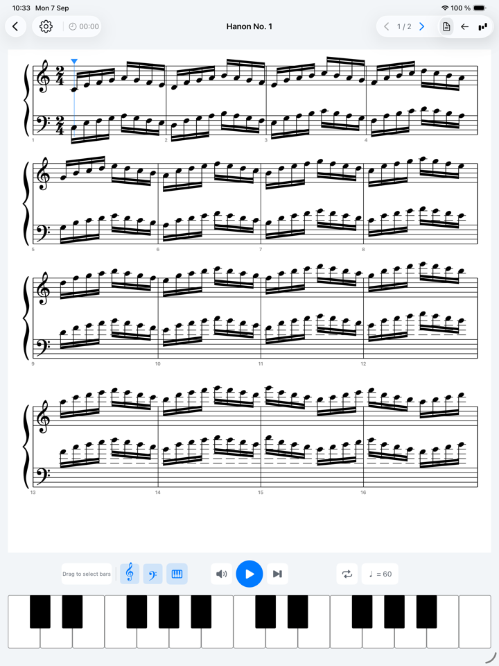 A Hanon exercise on iPad, engraved across the full page with a piano keyboard below