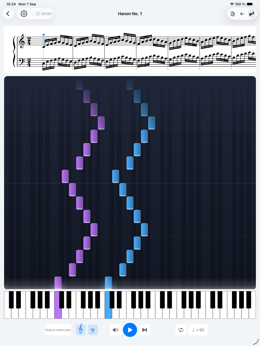 Falling-notes view on iPad: coloured bars descending onto a piano keyboard